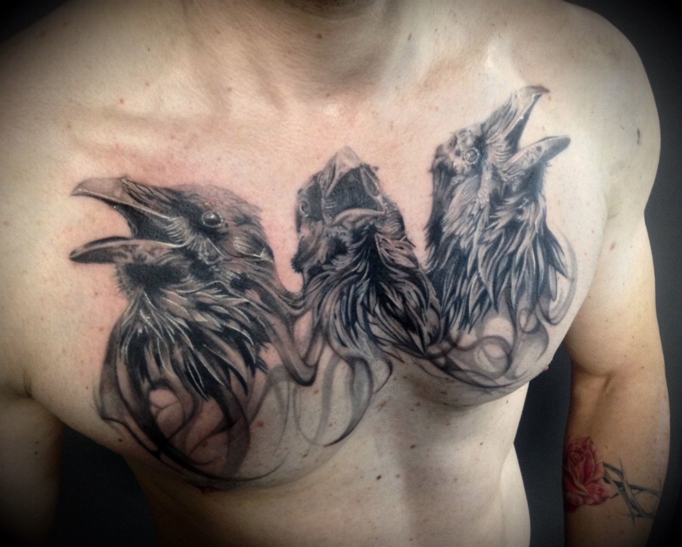 Realistic raven and crow tattoo by Virginie Tatouage