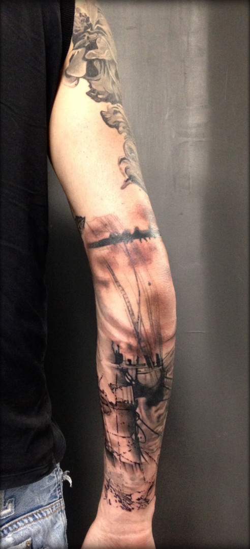 Full arm black and white tattoo with a boat by Virginie Tatouage Strasbourg city