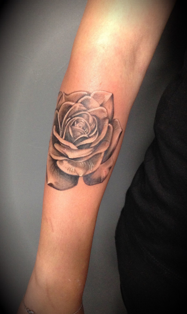 Realistic black and grey rose tattoo by Virginie Tatouage